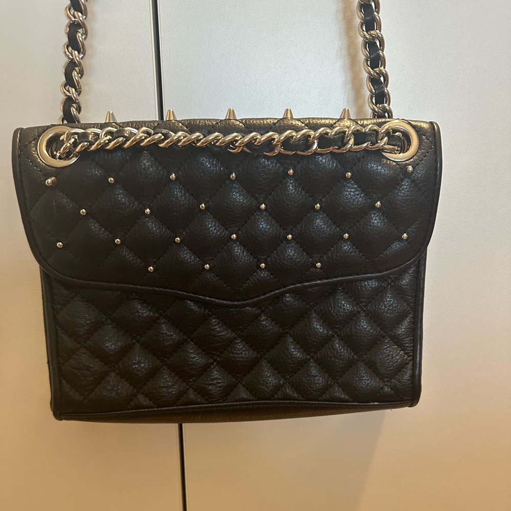 Rebecca Minkoff black crossbody with silver studs and strap